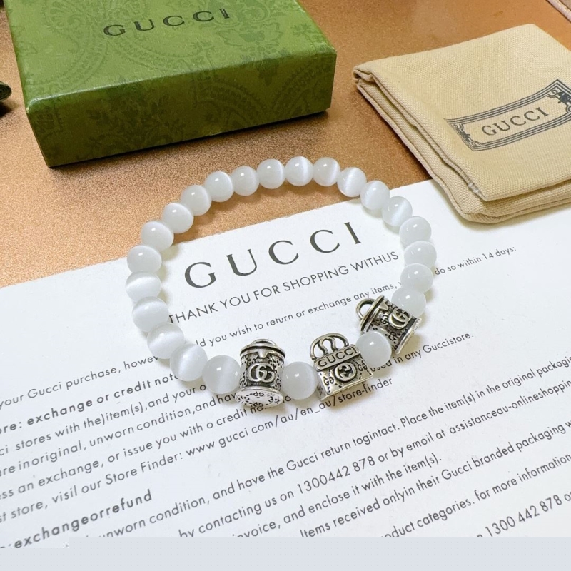 G*u*i bracelets